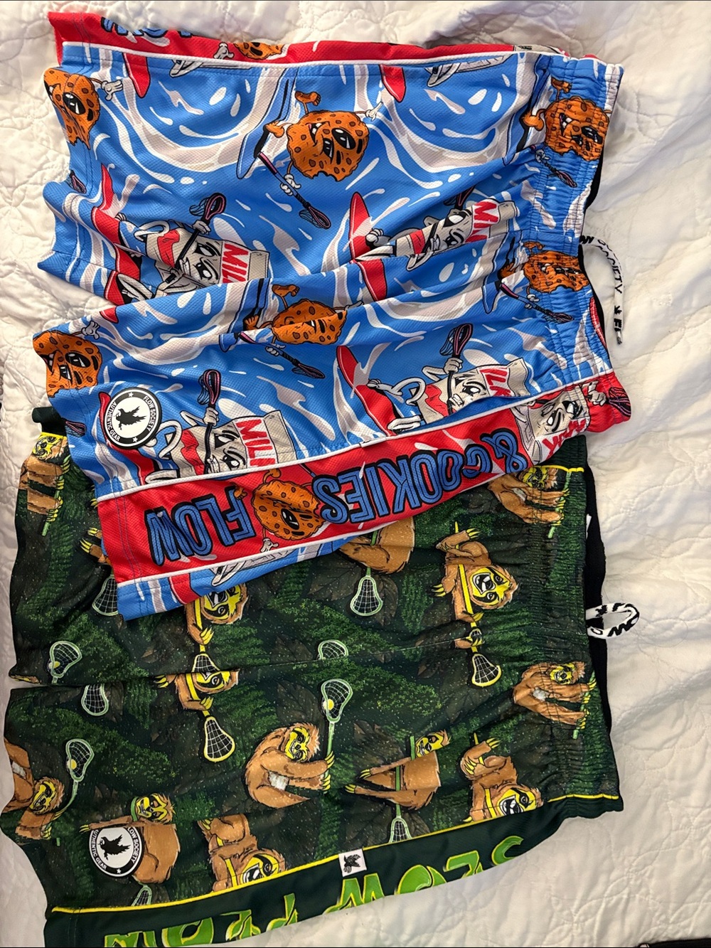Boys Flow Society Lacrosse shorts size L- cookies and milk and sloth lacrosse